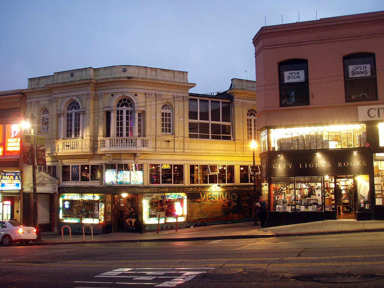 City Lights and Vesuvio, Columbus Avenue at night — the corner the Beats made a landmark