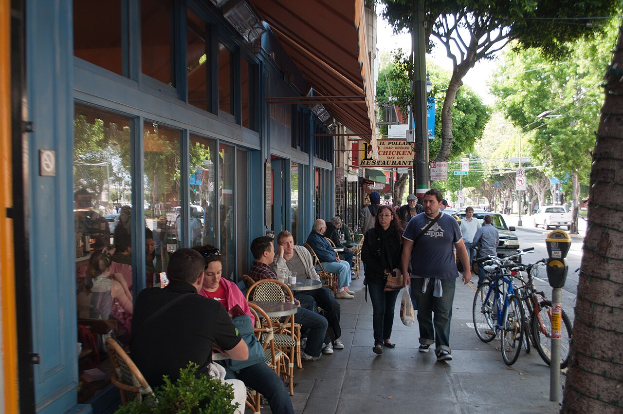 Columbus Avenue sidewalk life, the ordinary hour the festival is made of