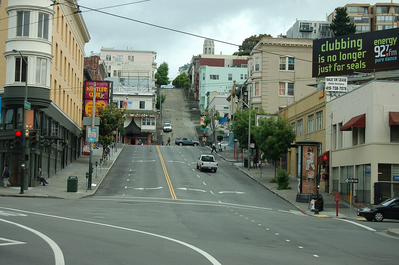 Kearny Street rising toward Coit Tower, the hill that frames every walk home